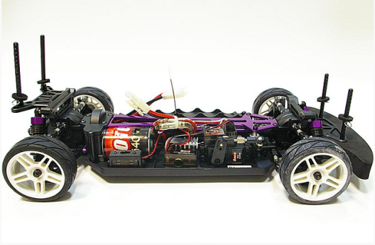 Модель автомобиля с пультом управления, элементами питания и дополнительными элементами шасси
